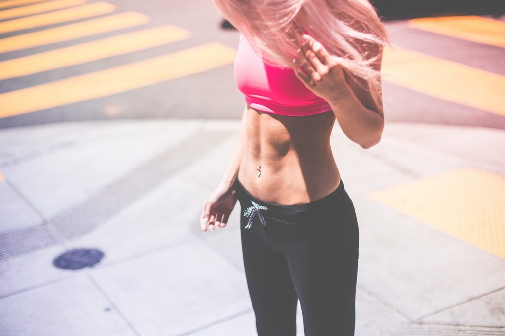Photo of woman with fit body and slim tummy
